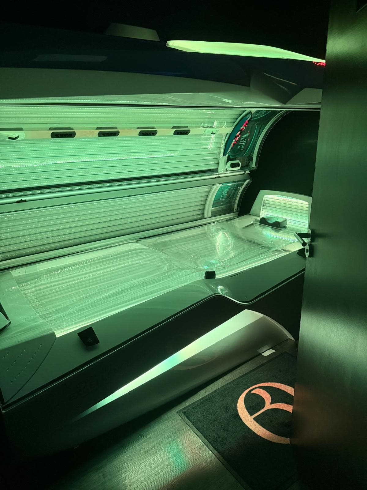 Lay-down tanning bed at Olive Beauty Marston Moretaine
